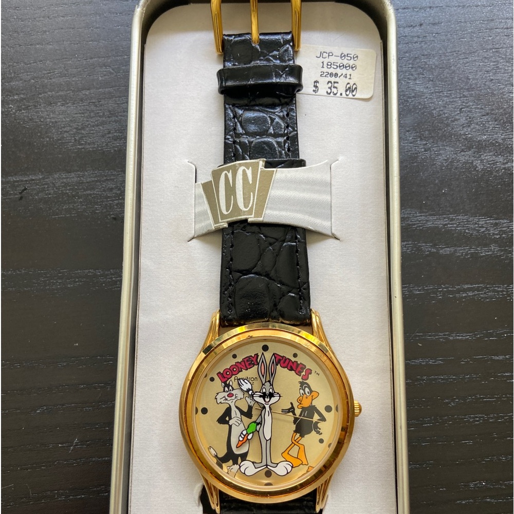 Vintage Looney Tunes Armitron Collectables Sylvester, and Daffy watch.